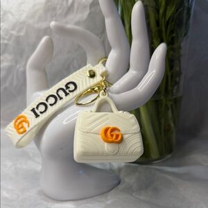 White Quilted Mini Bag Keychain with Orange GG Logo